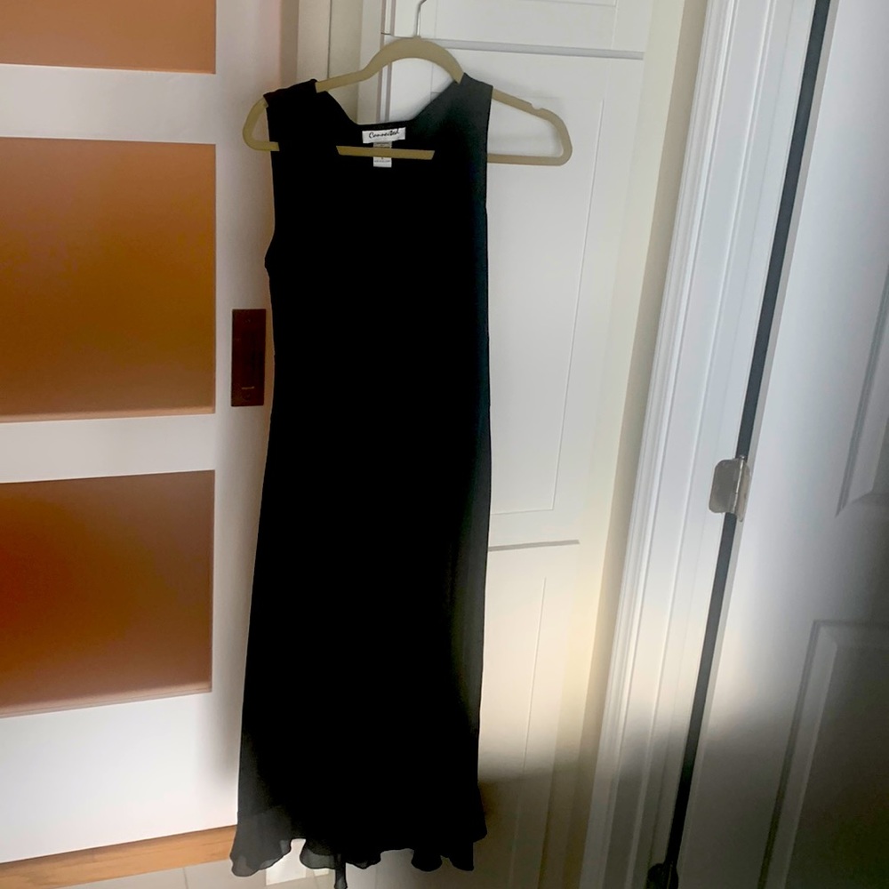 Fun black midi length dress velour with chiffon accent ruffles on slit & bottom